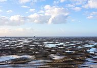 Büsum-Watt-Horizont, Weite Wattlandschaft unter blauem Himmel in Büsum., Weite Wattlandschaft unter blauem Himmel in Büsum.